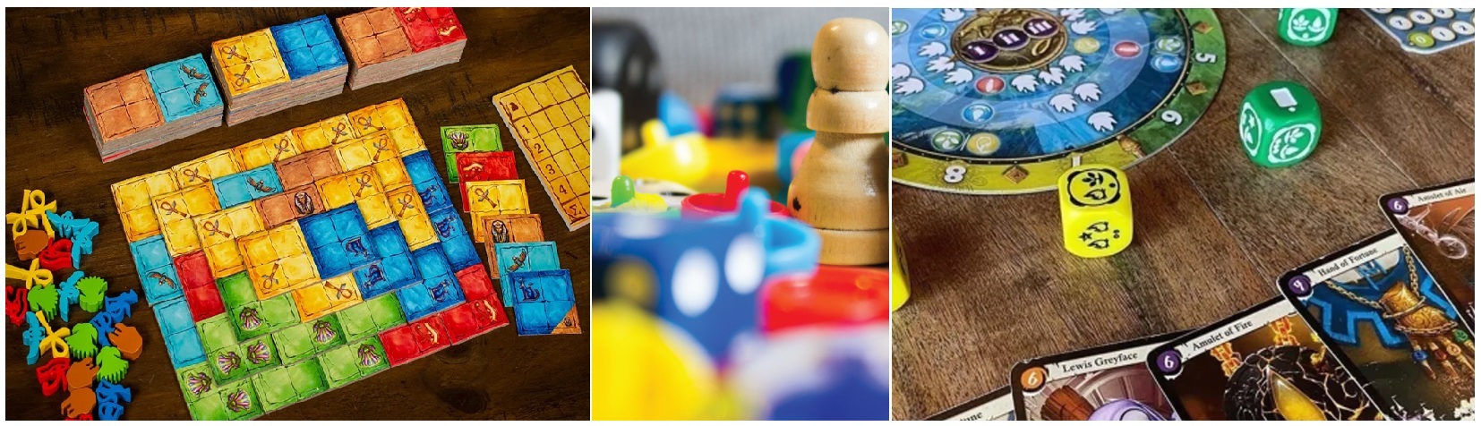 Set of red dice stacked together on wooden table placed on sunny terrace in daylight